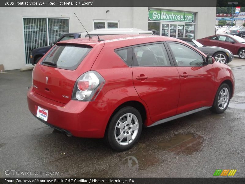 Red Hot Metallic / Ebony 2009 Pontiac Vibe 2.4
