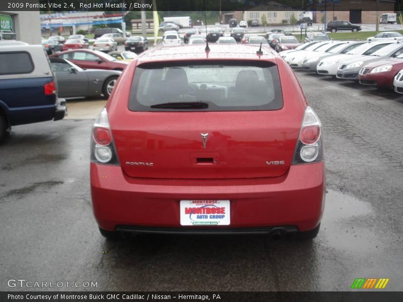 Red Hot Metallic / Ebony 2009 Pontiac Vibe 2.4
