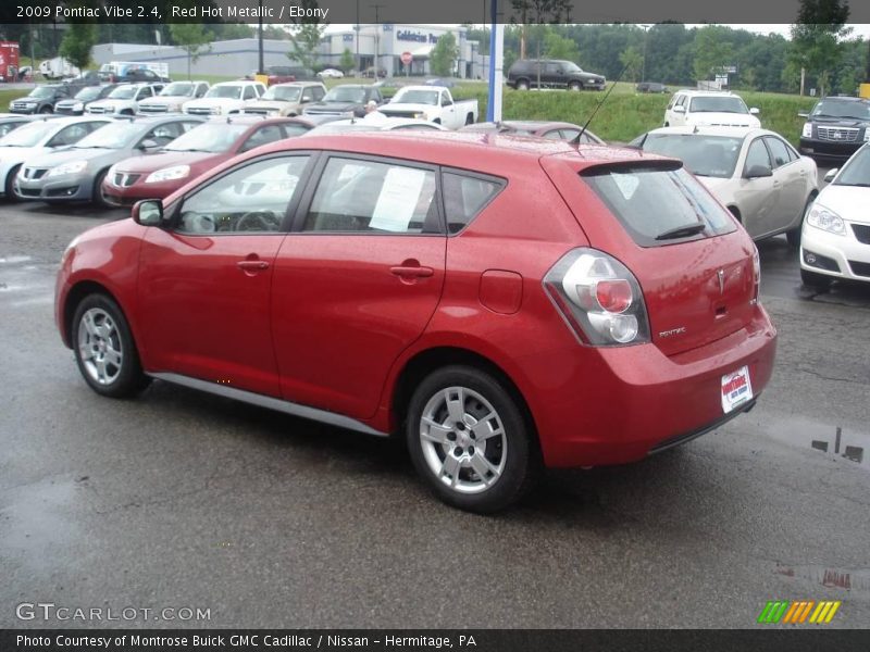 Red Hot Metallic / Ebony 2009 Pontiac Vibe 2.4