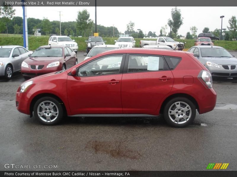 Red Hot Metallic / Ebony 2009 Pontiac Vibe 2.4