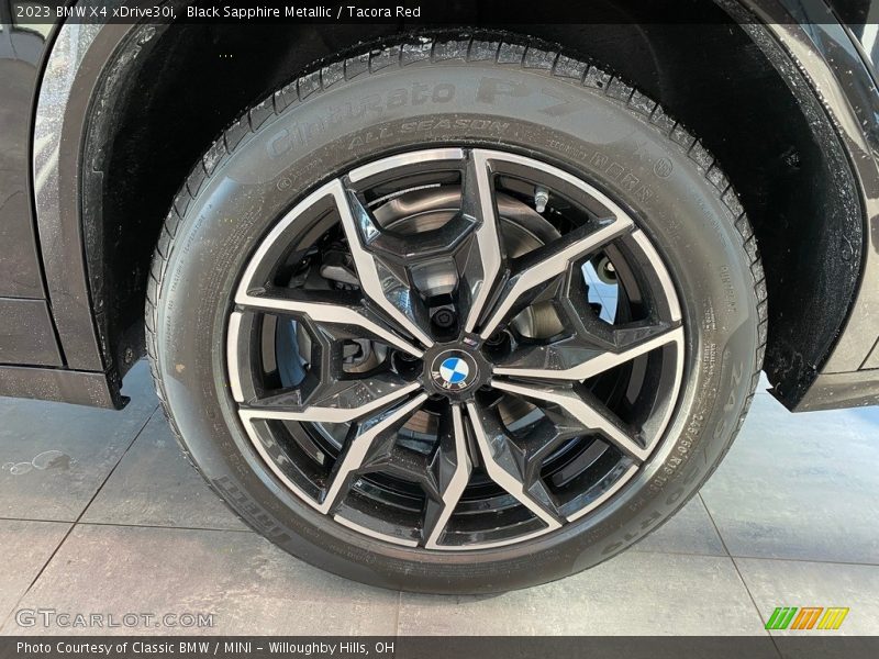 Black Sapphire Metallic / Tacora Red 2023 BMW X4 xDrive30i