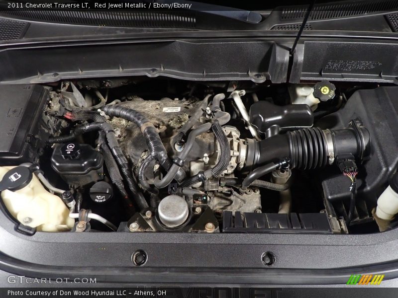 Red Jewel Metallic / Ebony/Ebony 2011 Chevrolet Traverse LT