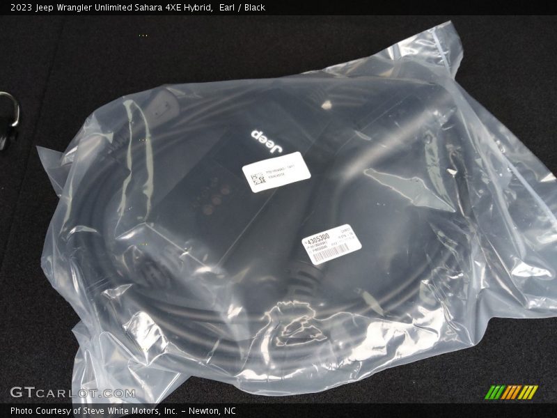 Earl / Black 2023 Jeep Wrangler Unlimited Sahara 4XE Hybrid