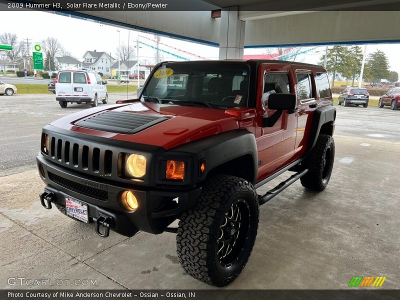 Solar Flare Metallic / Ebony/Pewter 2009 Hummer H3