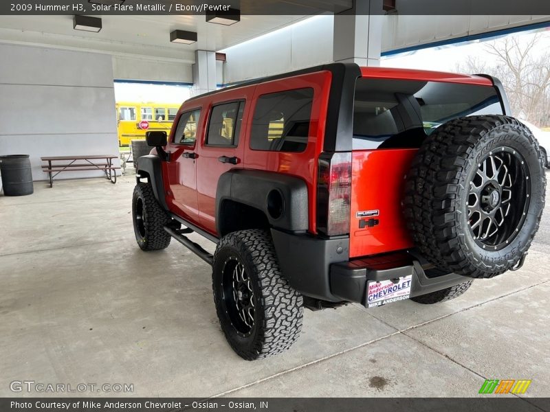 Solar Flare Metallic / Ebony/Pewter 2009 Hummer H3