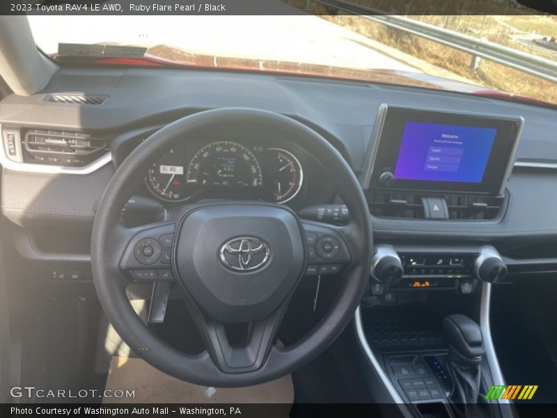 Ruby Flare Pearl / Black 2023 Toyota RAV4 LE AWD