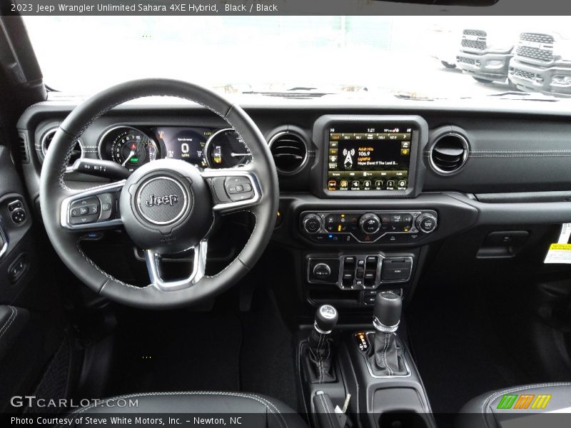 Black / Black 2023 Jeep Wrangler Unlimited Sahara 4XE Hybrid