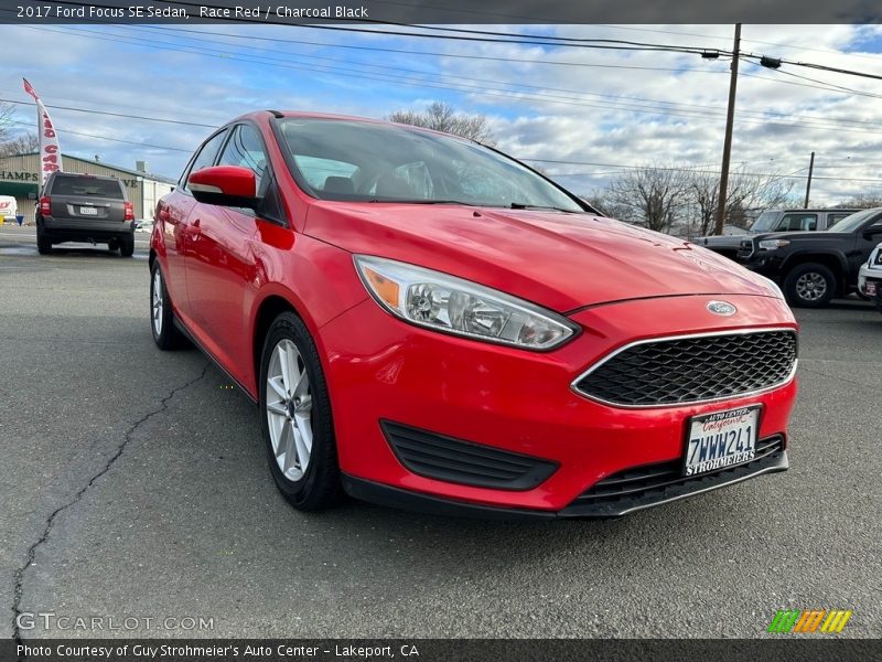 Race Red / Charcoal Black 2017 Ford Focus SE Sedan