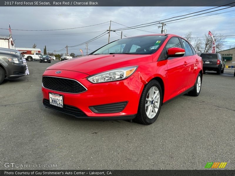 Race Red / Charcoal Black 2017 Ford Focus SE Sedan