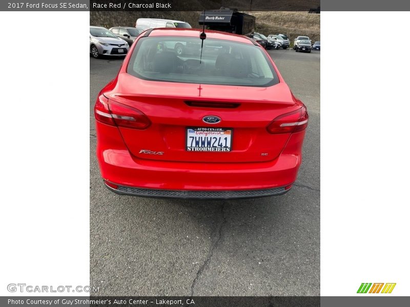 Race Red / Charcoal Black 2017 Ford Focus SE Sedan