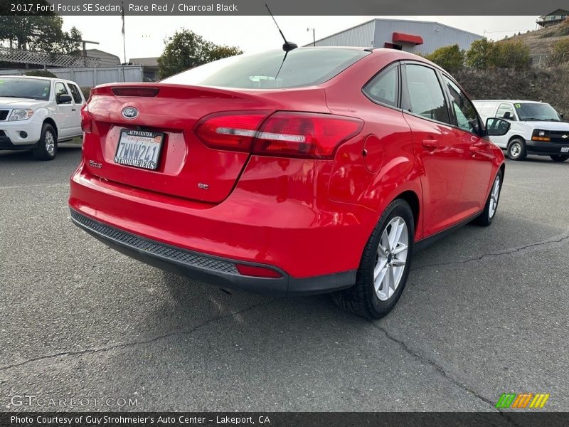 Race Red / Charcoal Black 2017 Ford Focus SE Sedan