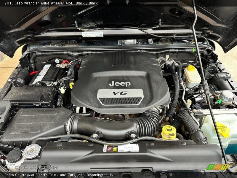 Black / Black 2015 Jeep Wrangler Willys Wheeler 4x4