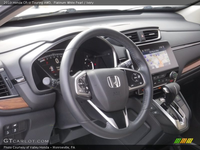 Platinum White Pearl / Ivory 2019 Honda CR-V Touring AWD