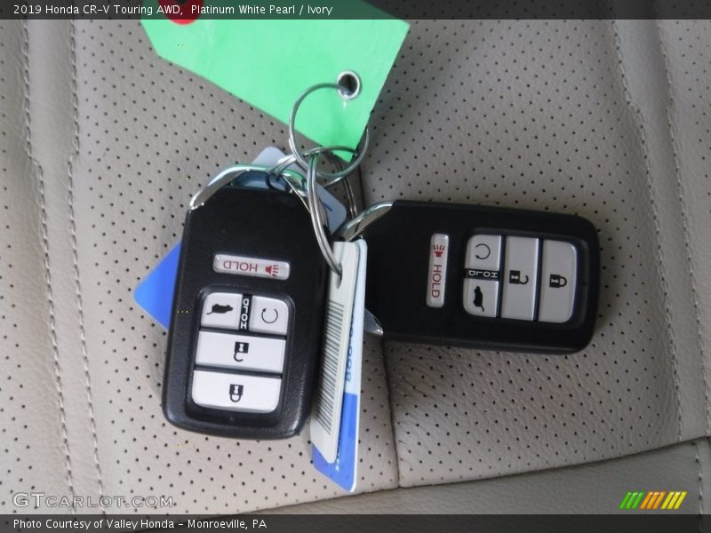 Platinum White Pearl / Ivory 2019 Honda CR-V Touring AWD