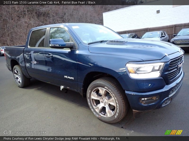 Front 3/4 View of 2023 1500 Laramie Crew Cab 4x4