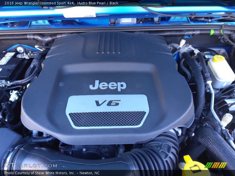 Hydro Blue Pearl / Black 2016 Jeep Wrangler Unlimited Sport 4x4