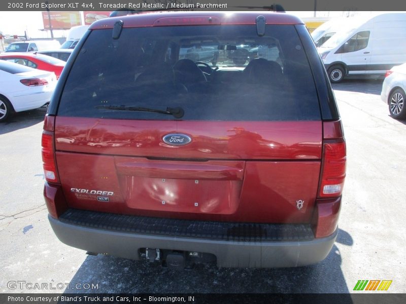 Toreador Red Metallic / Medium Parchment 2002 Ford Explorer XLT 4x4