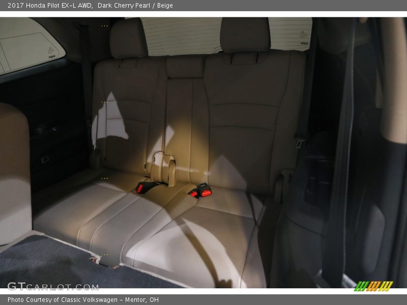 Dark Cherry Pearl / Beige 2017 Honda Pilot EX-L AWD