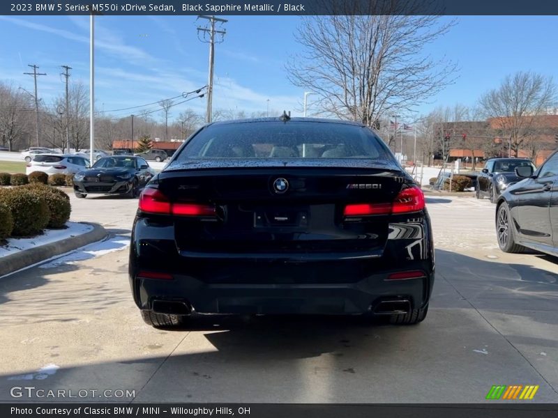 Black Sapphire Metallic / Black 2023 BMW 5 Series M550i xDrive Sedan