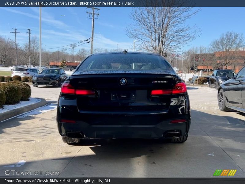 Black Sapphire Metallic / Black 2023 BMW 5 Series M550i xDrive Sedan