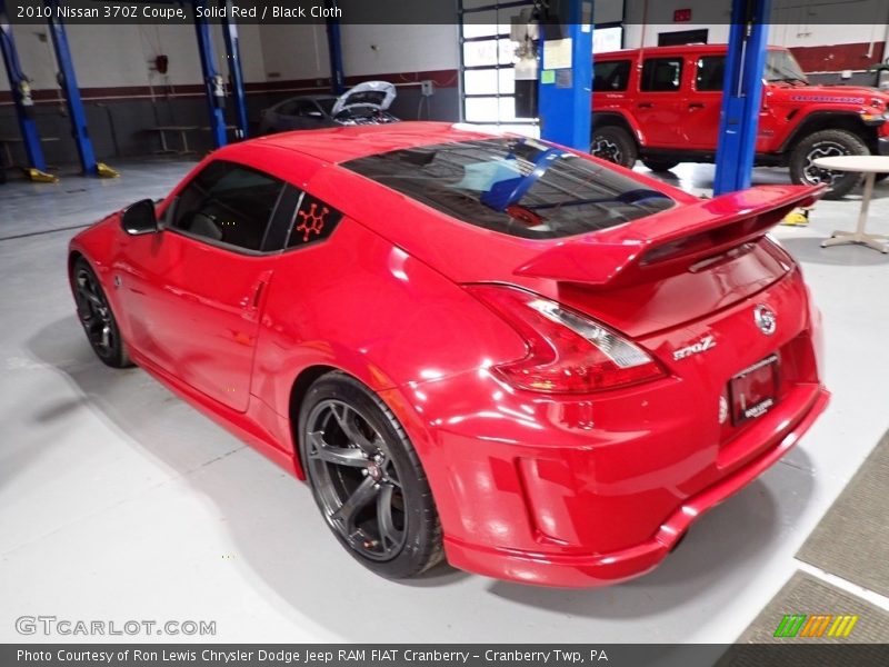 Solid Red / Black Cloth 2010 Nissan 370Z Coupe