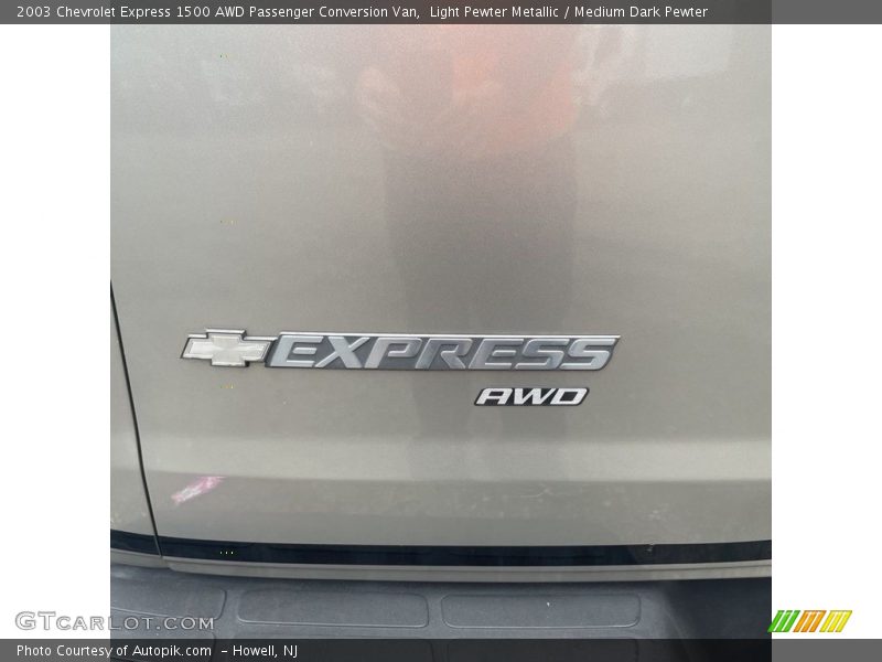  2003 Express 1500 AWD Passenger Conversion Van Logo