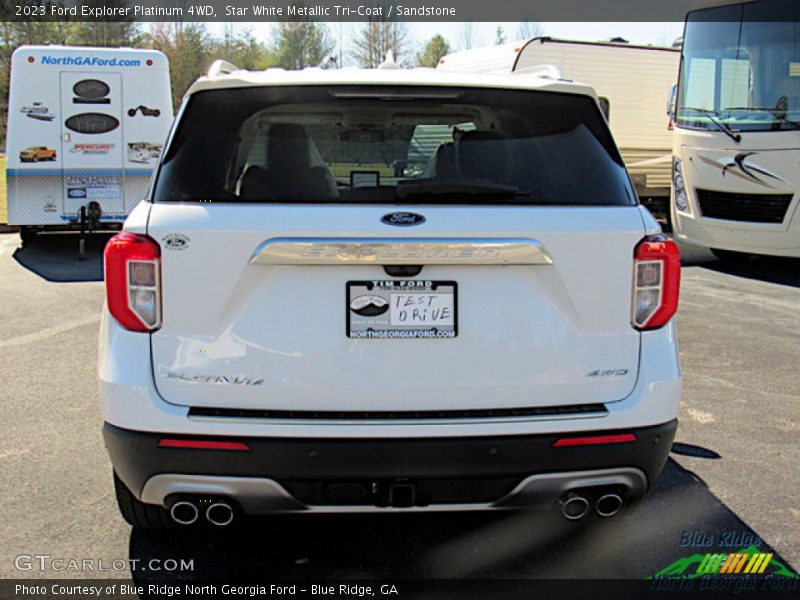Star White Metallic Tri-Coat / Sandstone 2023 Ford Explorer Platinum 4WD