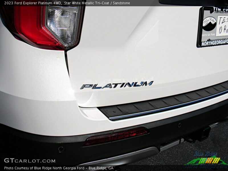 Star White Metallic Tri-Coat / Sandstone 2023 Ford Explorer Platinum 4WD