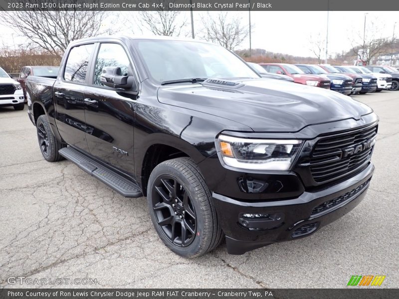 Front 3/4 View of 2023 1500 Laramie Night Edition Crew Cab 4x4