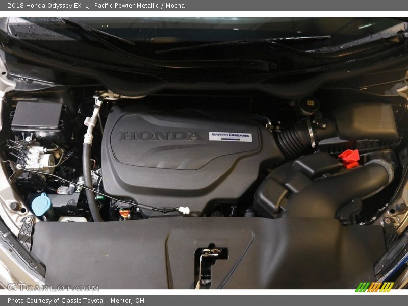 Pacific Pewter Metallic / Mocha 2018 Honda Odyssey EX-L