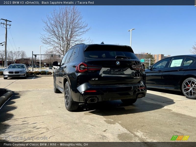 Black Sapphire Metallic / Tacora Red 2023 BMW X3 xDrive30i