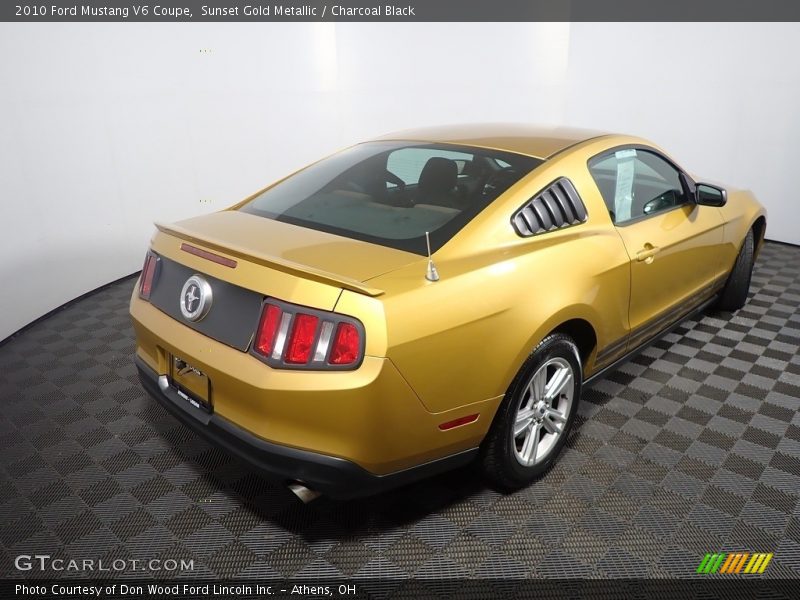 Sunset Gold Metallic / Charcoal Black 2010 Ford Mustang V6 Coupe