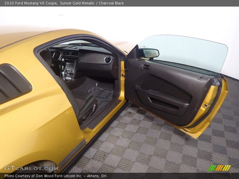 Sunset Gold Metallic / Charcoal Black 2010 Ford Mustang V6 Coupe