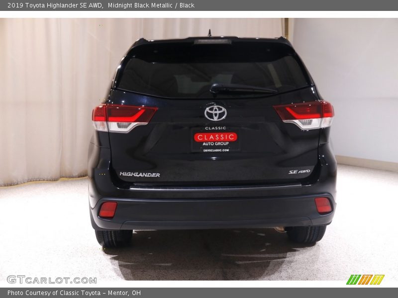 Midnight Black Metallic / Black 2019 Toyota Highlander SE AWD