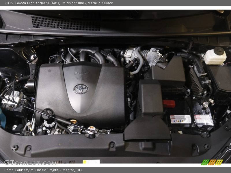 Midnight Black Metallic / Black 2019 Toyota Highlander SE AWD