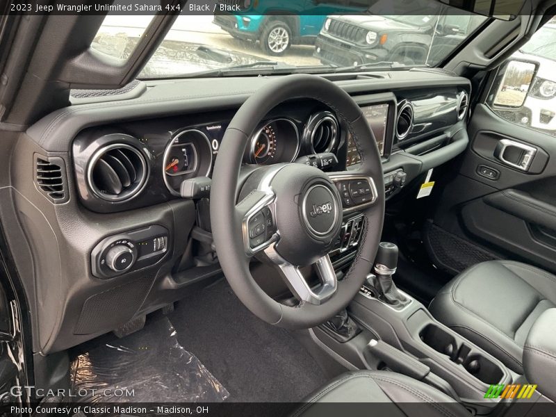 Black / Black 2023 Jeep Wrangler Unlimited Sahara 4x4