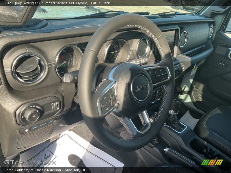 Earl / Black 2023 Jeep Wrangler Unlimited Sahara 4XE Hybrid