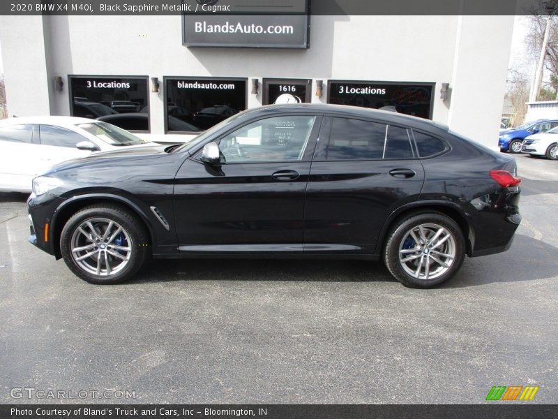 Black Sapphire Metallic / Cognac 2020 BMW X4 M40i