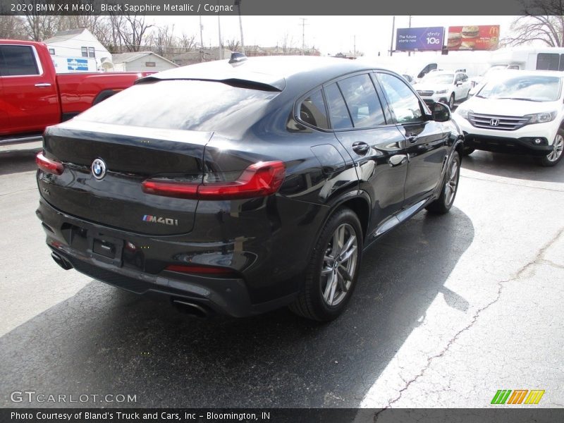 Black Sapphire Metallic / Cognac 2020 BMW X4 M40i