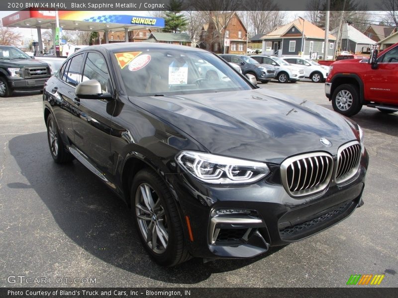 Black Sapphire Metallic / Cognac 2020 BMW X4 M40i