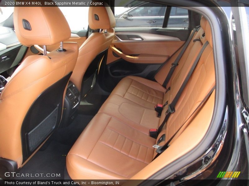 Black Sapphire Metallic / Cognac 2020 BMW X4 M40i
