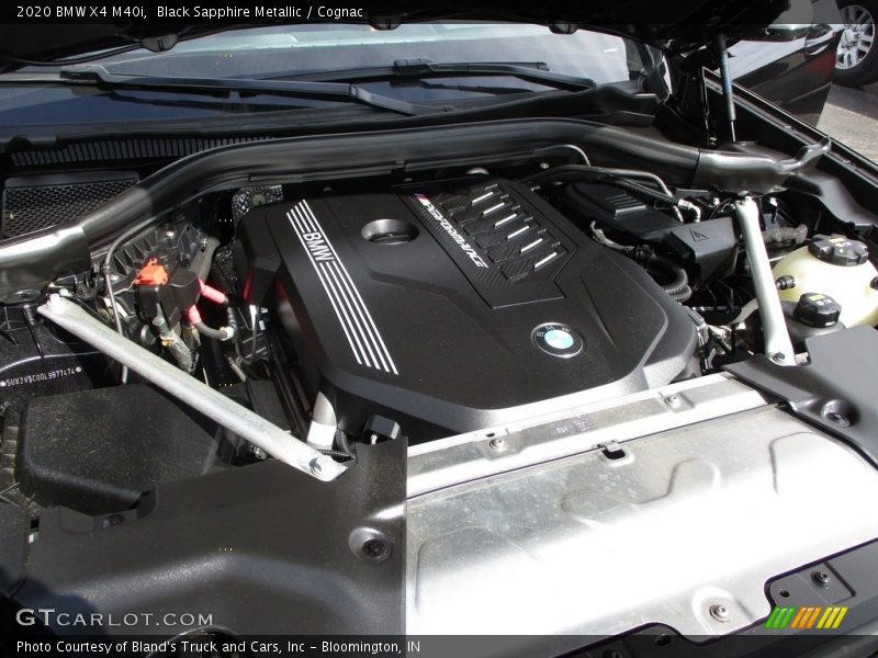 Black Sapphire Metallic / Cognac 2020 BMW X4 M40i