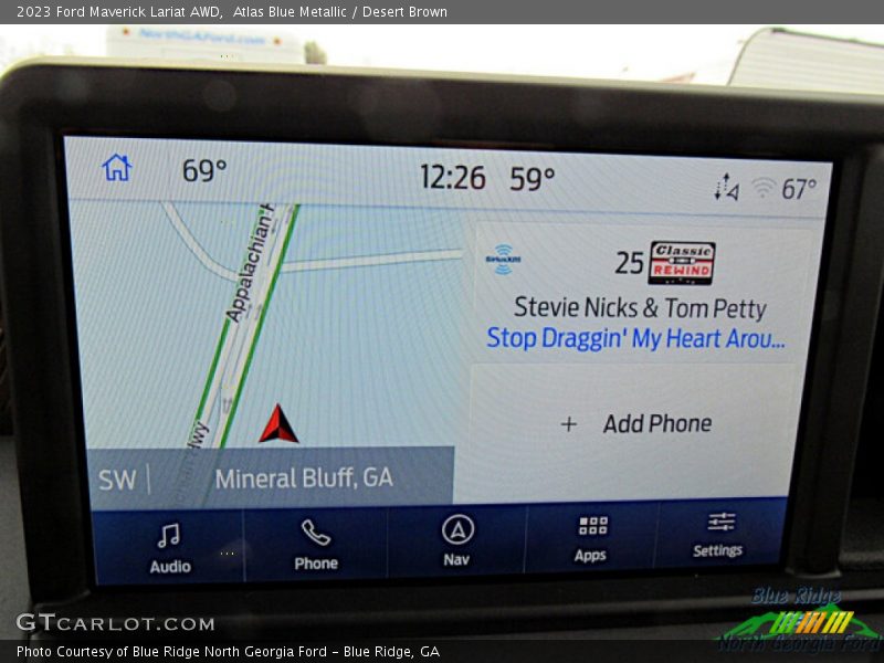 Atlas Blue Metallic / Desert Brown 2023 Ford Maverick Lariat AWD