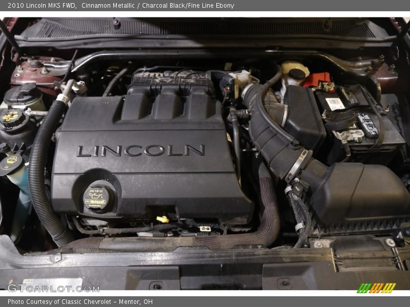 Cinnamon Metallic / Charcoal Black/Fine Line Ebony 2010 Lincoln MKS FWD