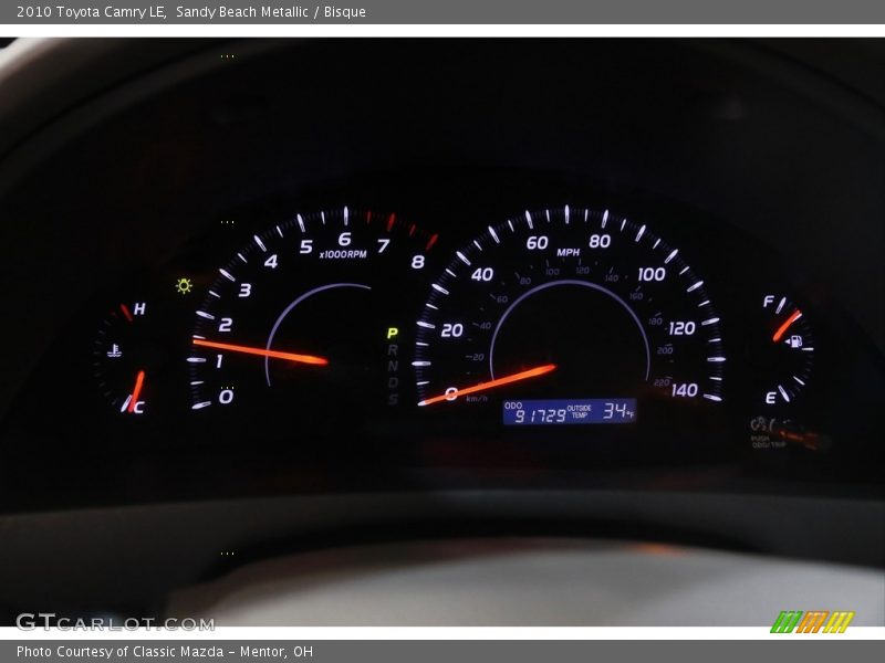 Sandy Beach Metallic / Bisque 2010 Toyota Camry LE