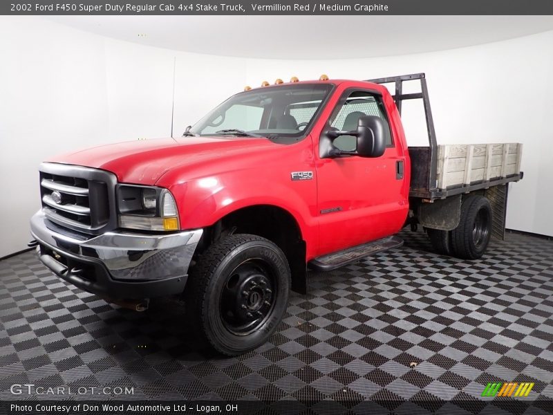 Front 3/4 View of 2002 F450 Super Duty Regular Cab 4x4 Stake Truck