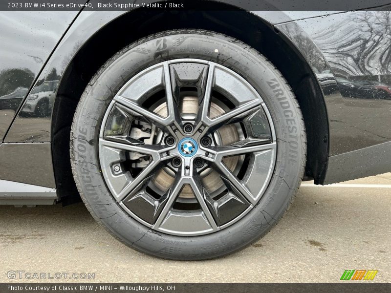 Black Sapphire Metallic / Black 2023 BMW i4 Series eDrive40