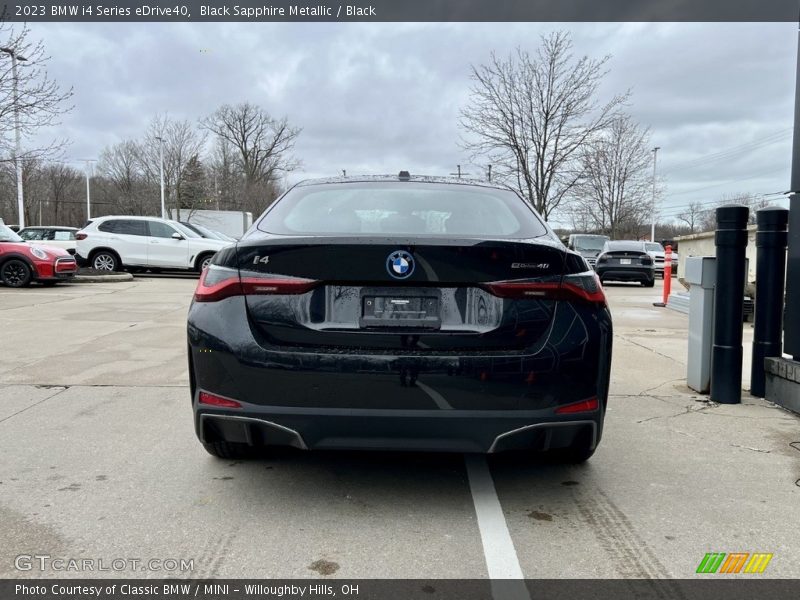 Black Sapphire Metallic / Black 2023 BMW i4 Series eDrive40