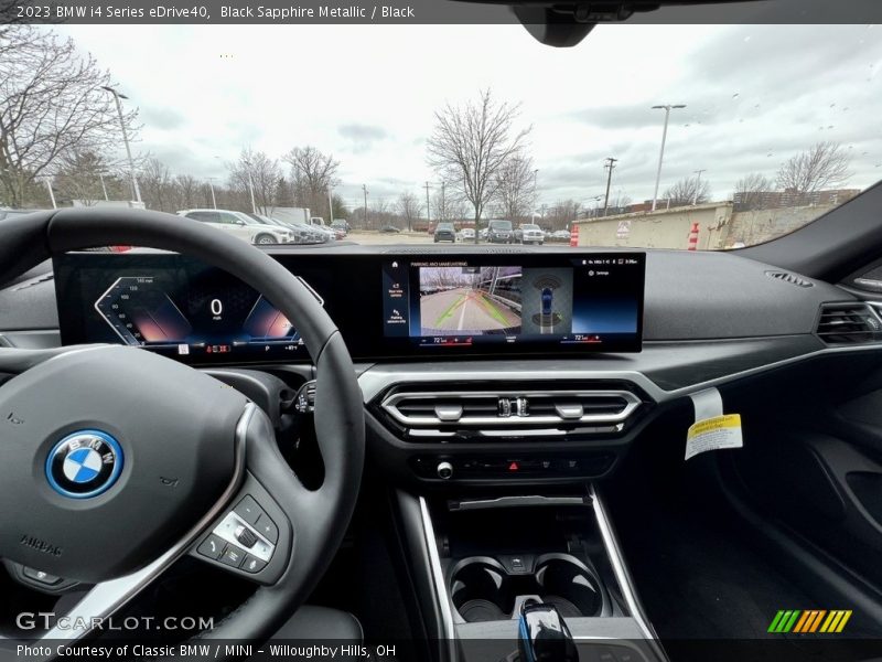 Black Sapphire Metallic / Black 2023 BMW i4 Series eDrive40