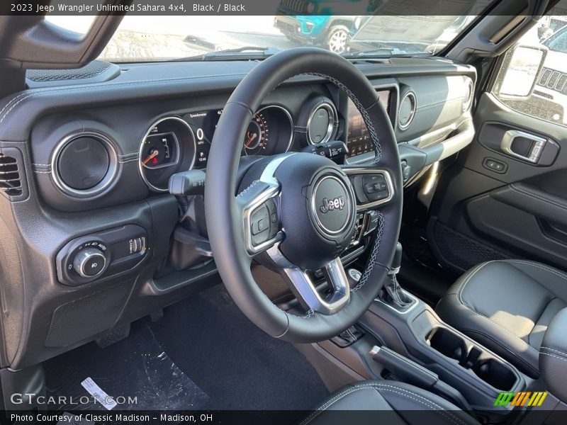 Black / Black 2023 Jeep Wrangler Unlimited Sahara 4x4